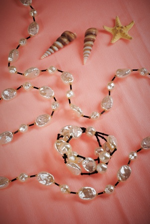 still life with sea shells and bijouterieの写真素材