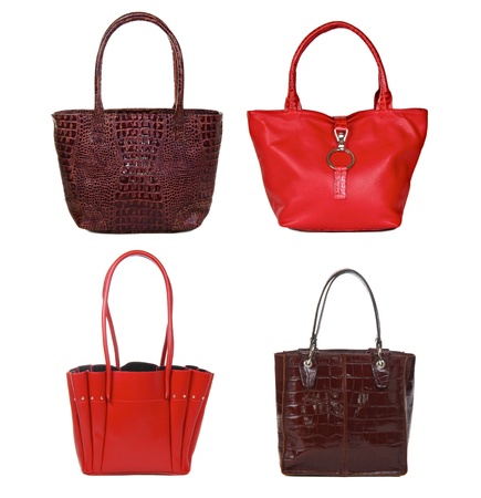 set of brown and red leather female bags isolated on whiteの写真素材