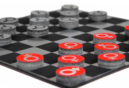 concept with male and  female gender symbols playing checkersの写真素材