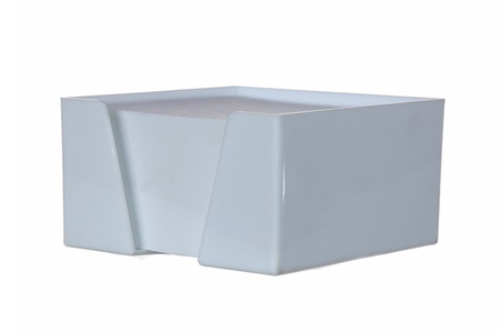 rest for block of white note pads isolated on whiteの写真素材