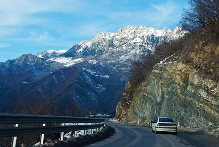 Winding mountain road in winter in Montenegroの写真素材