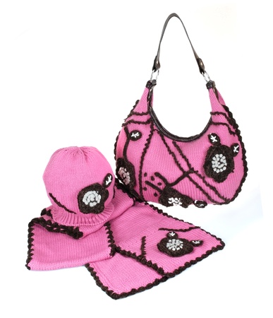 Woollen kit. Bag, hat and scarf isolated on white.の写真素材