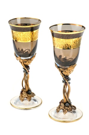 two tall wine goblets isolated on whiteの写真素材