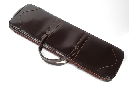 leather brown case photographed on white backgroundの写真素材