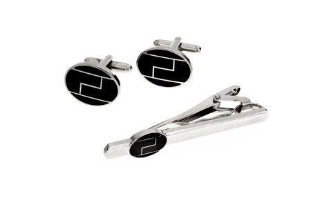 silver cuff link and tie pin isolated on white backgroundの写真素材