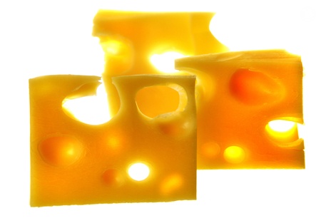 tasty piece of cheese isolated on whiteの写真素材