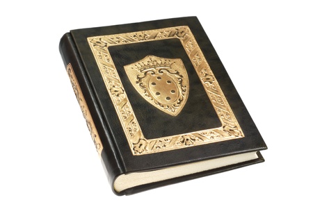 black vintage leather book isolated on whiteの写真素材