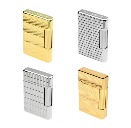 Set of silver and golden lighters isolated on whiteの写真素材