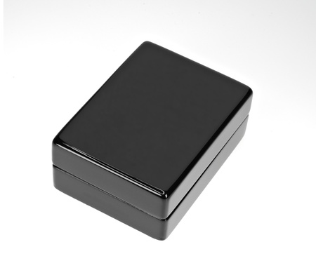 black polished  gift box isolated on whiteの写真素材
