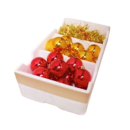 Box full of red and golden Christmas decorationの写真素材