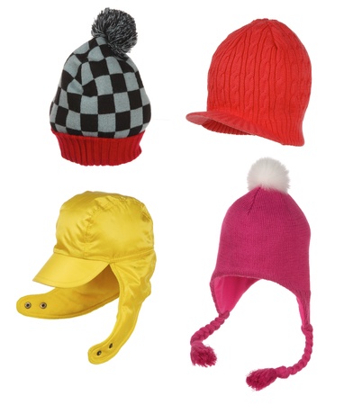 different winter hats isolated on whiteの写真素材