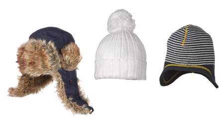 set of different winter hats isolated on whiteの写真素材