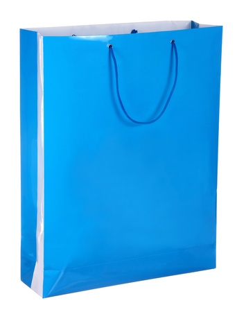 blue shopping paper bag isolated on whiteの写真素材