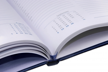 view of calendar in opened notebook ogranizerの写真素材