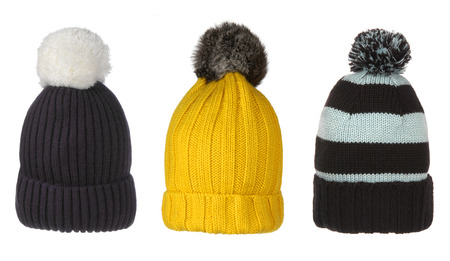 set of winter hats with pompon isolated on white 