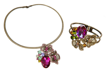 pretty pendant and bracelet isolated on whiteの写真素材