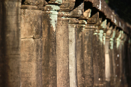 ancient stone pillars at Angkor Watの写真素材