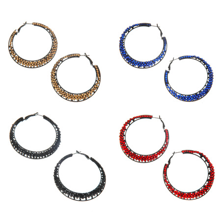 set of round metal earrings isolated on whiteの写真素材