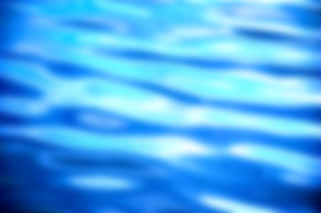 blurred background of blue waterの写真素材