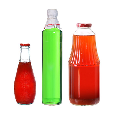 collection of juice bottles isolated on whiteの写真素材