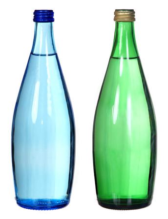 blue and green bottles isolated on white の写真素材