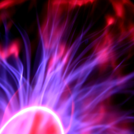 magical glittering lightnings on black backgroundの写真素材