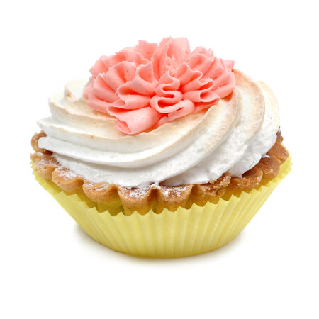 Pink birthday cupcake on white backgroundの写真素材