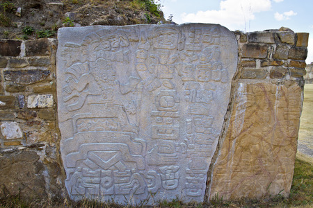 Carved stones of the ruins of Monte Alban, Oaxaca, Mexicoの写真素材