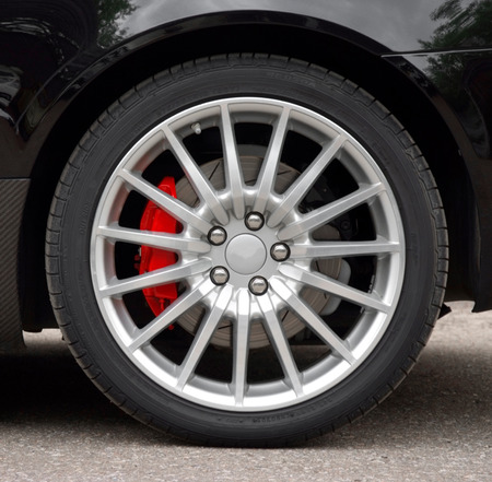 Car wheel of a black carの写真素材