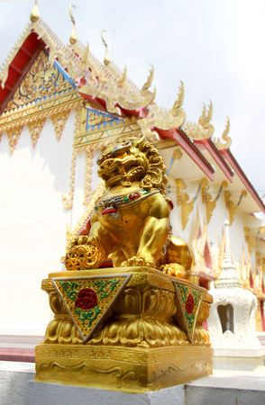 Chinese guardian lion in front of buddist templeの写真素材