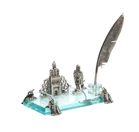 decorative glass inkstand isolated on whiteの写真素材