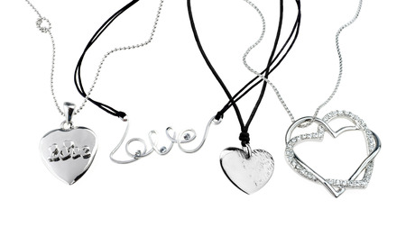 set of chains with heart pendants isolated on whiteの写真素材