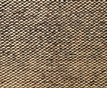 background of an old tile roofの写真素材