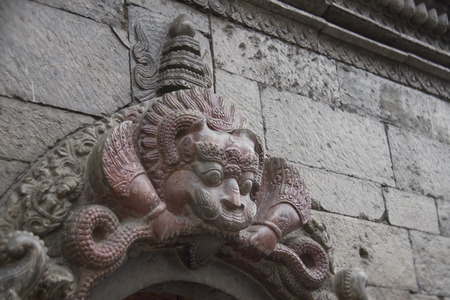 Bas-relief of demon in Pashupatinath temple, Khatmandu, Nepalの写真素材