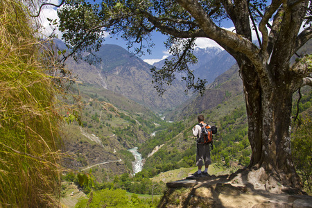 hiker stands on the hill