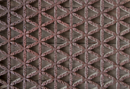 window lattice made from carved woodの写真素材