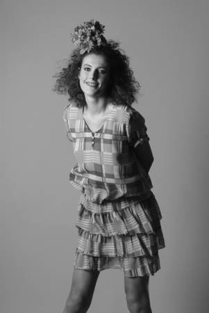 black and white image of a girl with a flower in her hairの写真素材