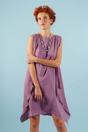 girl poses in purple flowing dressの写真素材