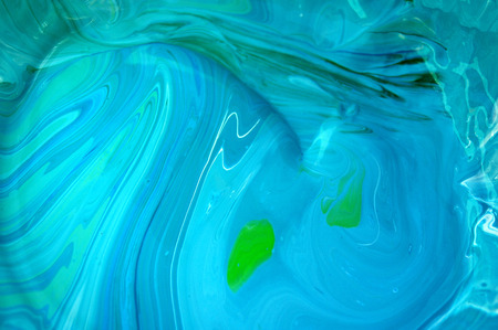 Mixed blue paint backgroundの写真素材