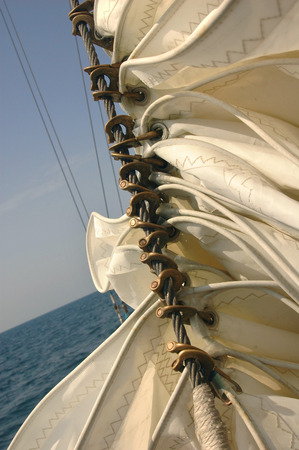 Sails furled on sailing shipの写真素材