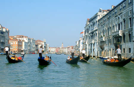 Gondolas floating on the canal in Veniceの写真素材