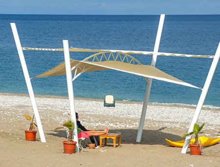 Area lifeguard on the Mediterranean, lonely lounger on the seashoreの写真素材