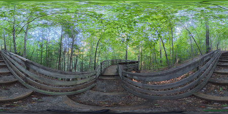 360 panorama VR, spherical image view of a wooden deck with benches, part of urban green...