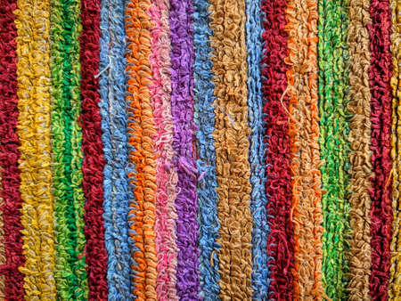 a cloth with a bright colorful pattern photographed during the dayの写真素材