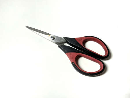 small scissors that have been used frequently and the paint is peeling offの写真素材