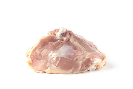 raw chicken thigh meat isolated on a white backgroundの写真素材