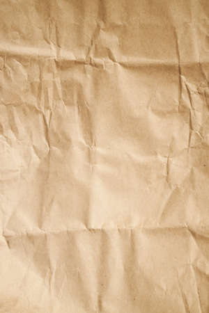 brown wrapped paper texture backdrop. vertical orientationの写真素材
