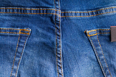 denim blue jeans cloth background backdrop. jean fabric
