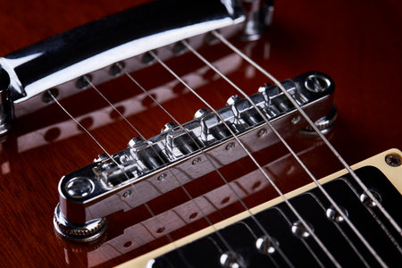 close up view for electric guitar. dark moody studio shot. love music concept backdrop