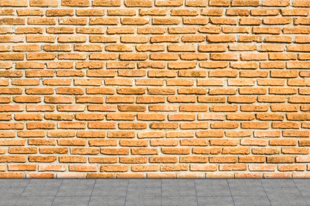 concrete plank walk way with Brick wall colurful color backgroundの写真素材